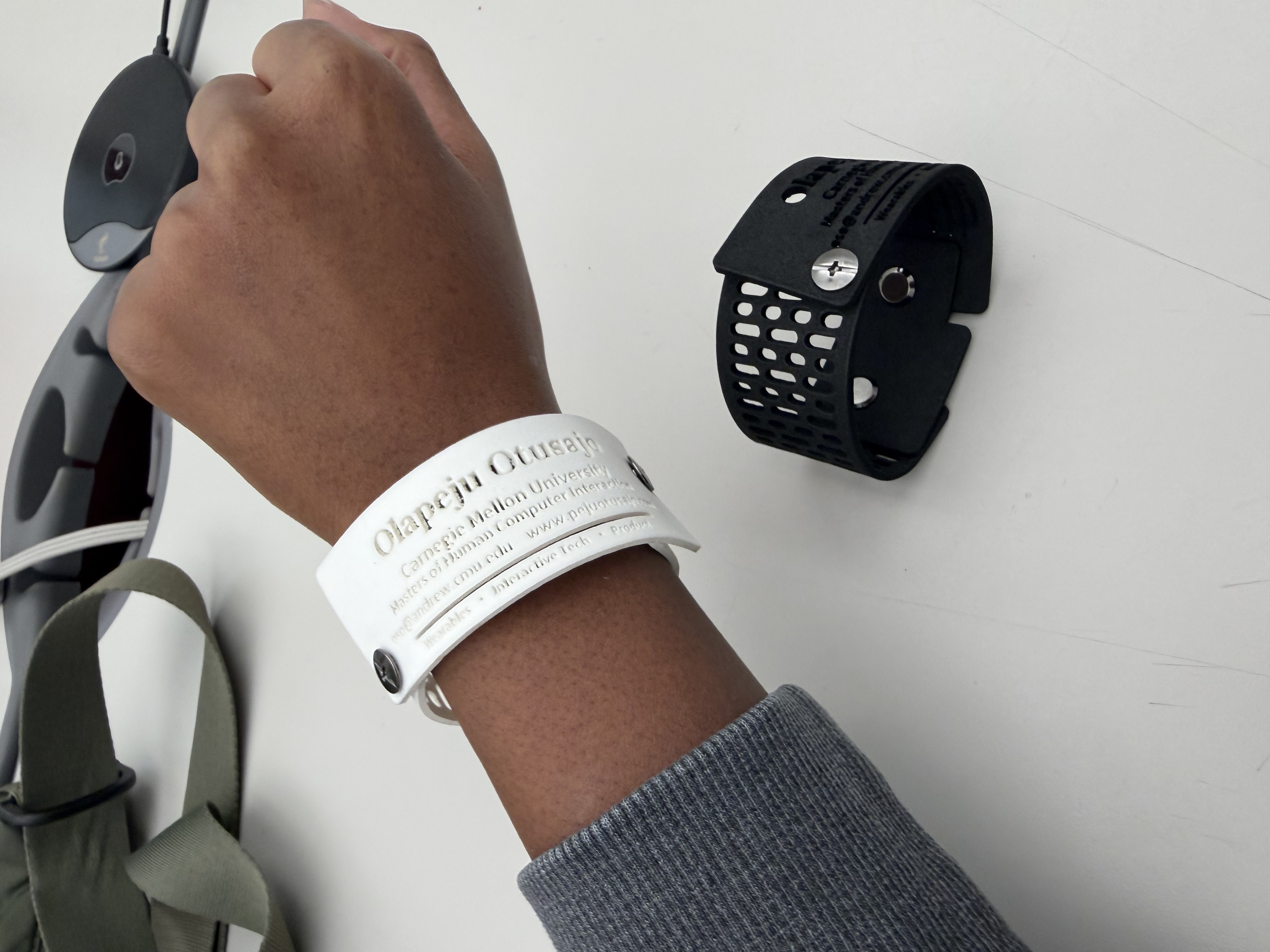 Transformable foam business card that becomes a bracelet